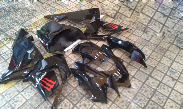 Custom fairings for 2004 2005 ZX10R glossy black with Monster symbol.