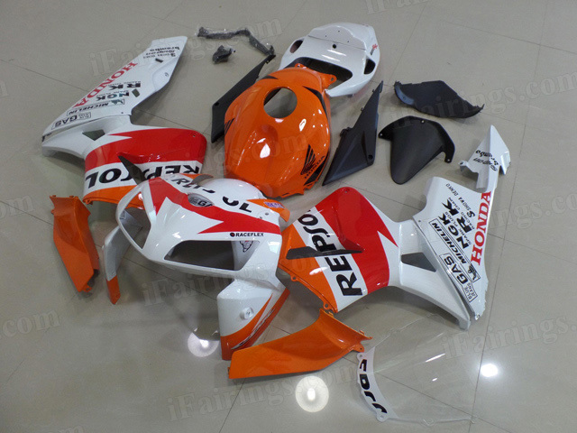 2005 2006 Honda CBR600RR orange and white repsol graphic fairings.