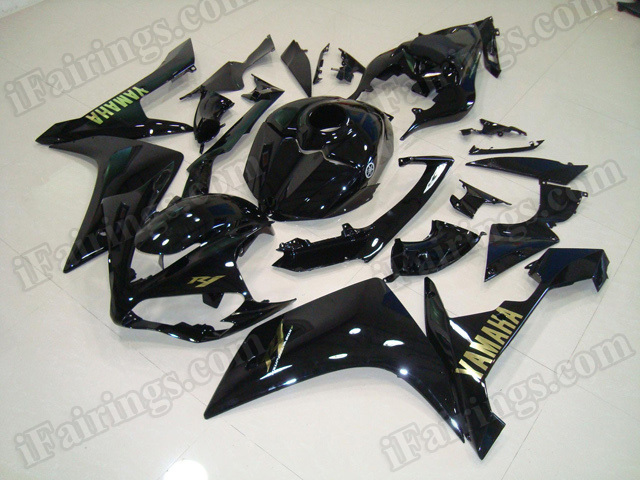 Motorcycle fairings/body kits for 2007 2008 Yamaha YZF R1 glossy black with gold stickers.