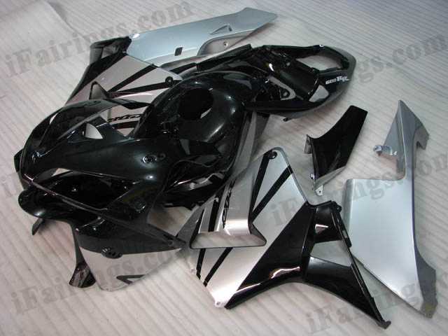 2005 2006 Honda CBR600RR black and silver fairings.